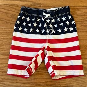 Boys American Flag 🇺🇸 swim trunks.